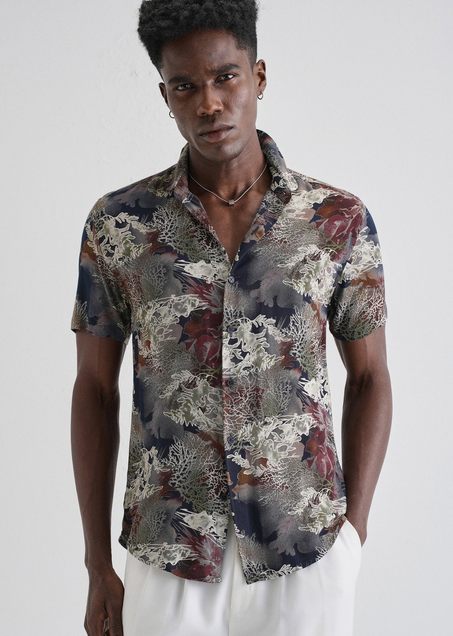 Coral Oasis Blue Feather shirt